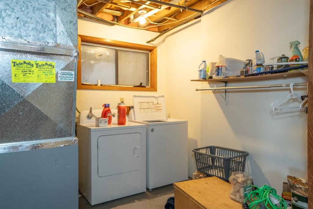 4908 47 Street, Clive, AB - Indoor Photo Showing Laundry Room