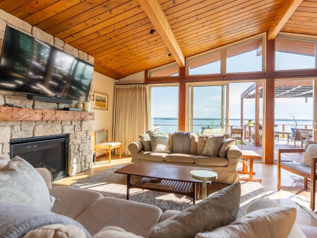 391 Birchcliff Road, Birchcliff, AB - Indoor Photo Showing Living Room With Fireplace