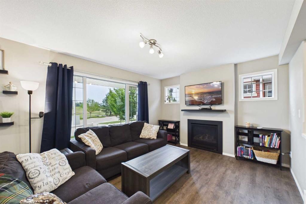 19 Golden Crescent, Red Deer, AB - Indoor Photo Showing Living Room With Fireplace