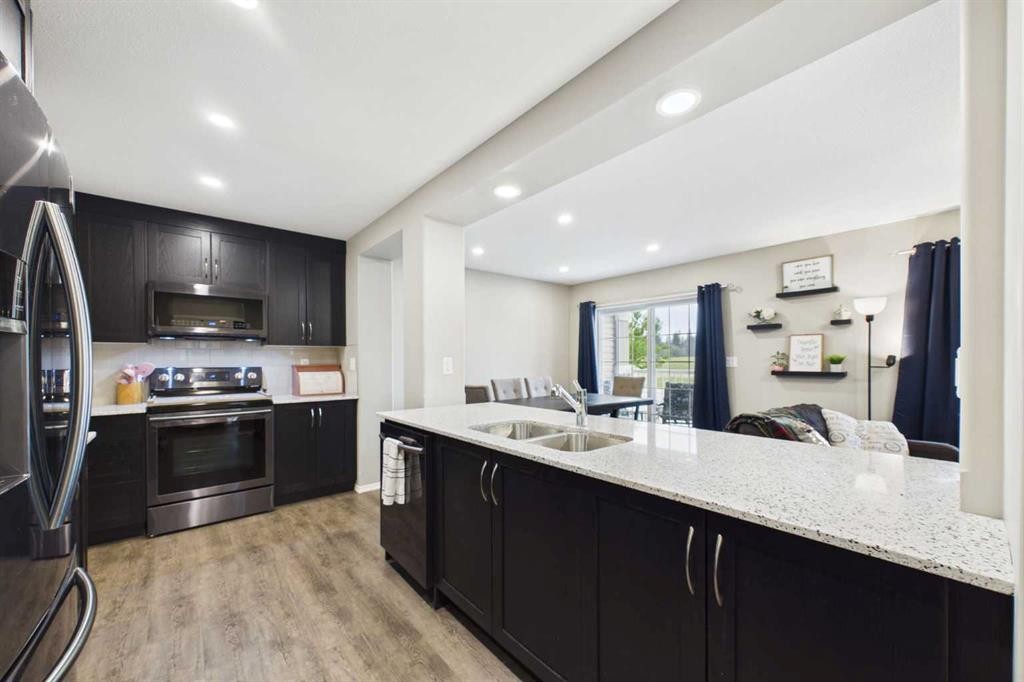 19 Golden Crescent, Red Deer, AB - Indoor Photo Showing Kitchen With Stainless Steel Kitchen With Double Sink With Upgraded Kitchen