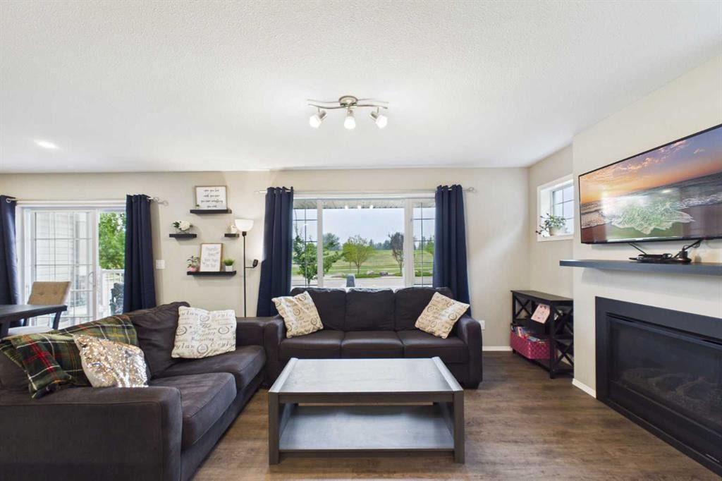 19 Golden Crescent, Red Deer, AB - Indoor Photo Showing Living Room With Fireplace