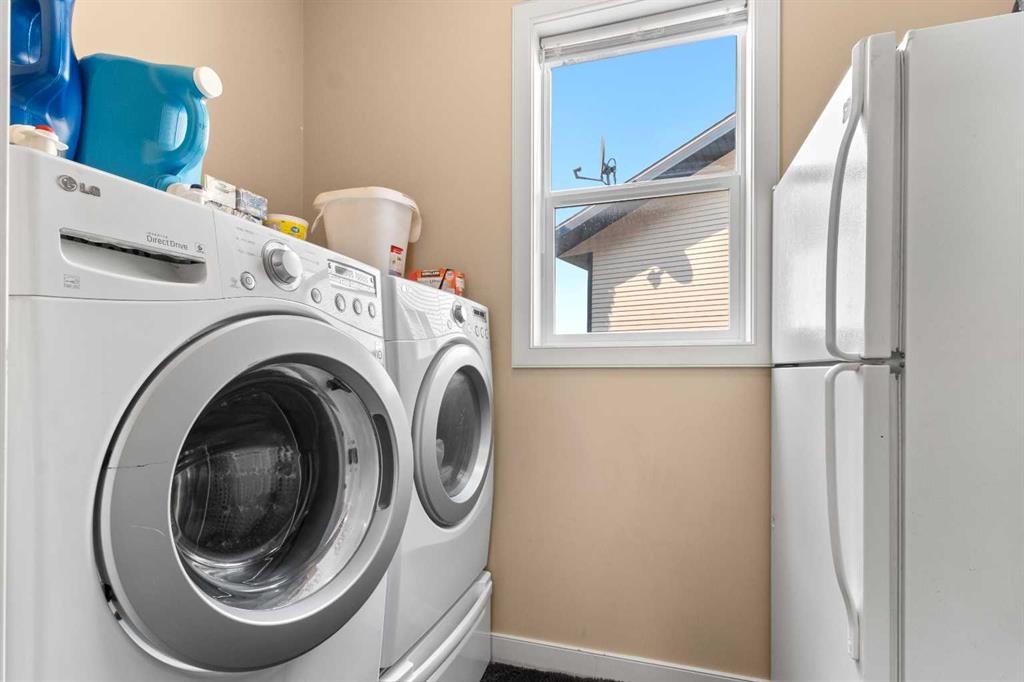 5 Lambertson Place, Sylvan Lake, AB - Indoor Photo Showing Laundry Room