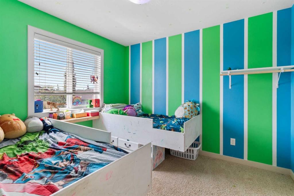 5 Lambertson Place, Sylvan Lake, AB - Indoor Photo Showing Bedroom