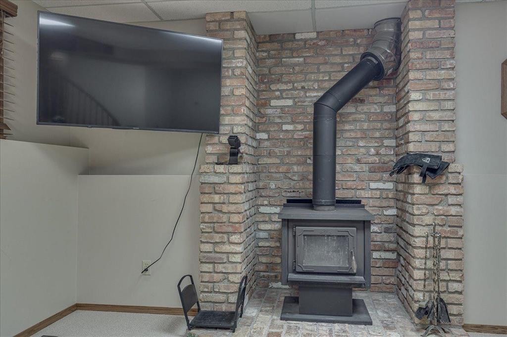 3908 39 Street Close, Ponoka, AB - Indoor With Fireplace