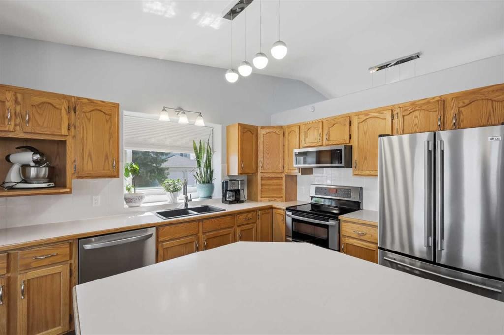 73 Duncan Crescent, Red Deer, AB - Indoor Photo Showing Kitchen With Stainless Steel Kitchen With Double Sink