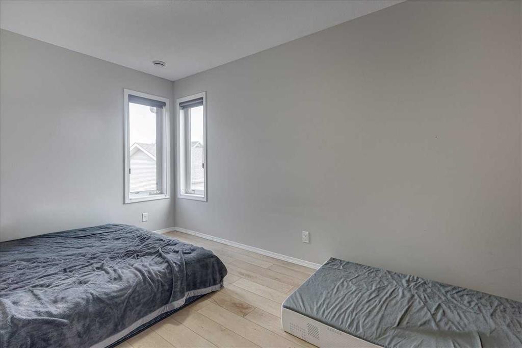 13 Rogers Road, Sylvan Lake, AB - Indoor Photo Showing Bedroom