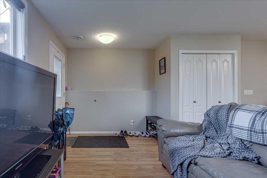 13 Rogers Road, Sylvan Lake, AB - Indoor Photo Showing Bedroom