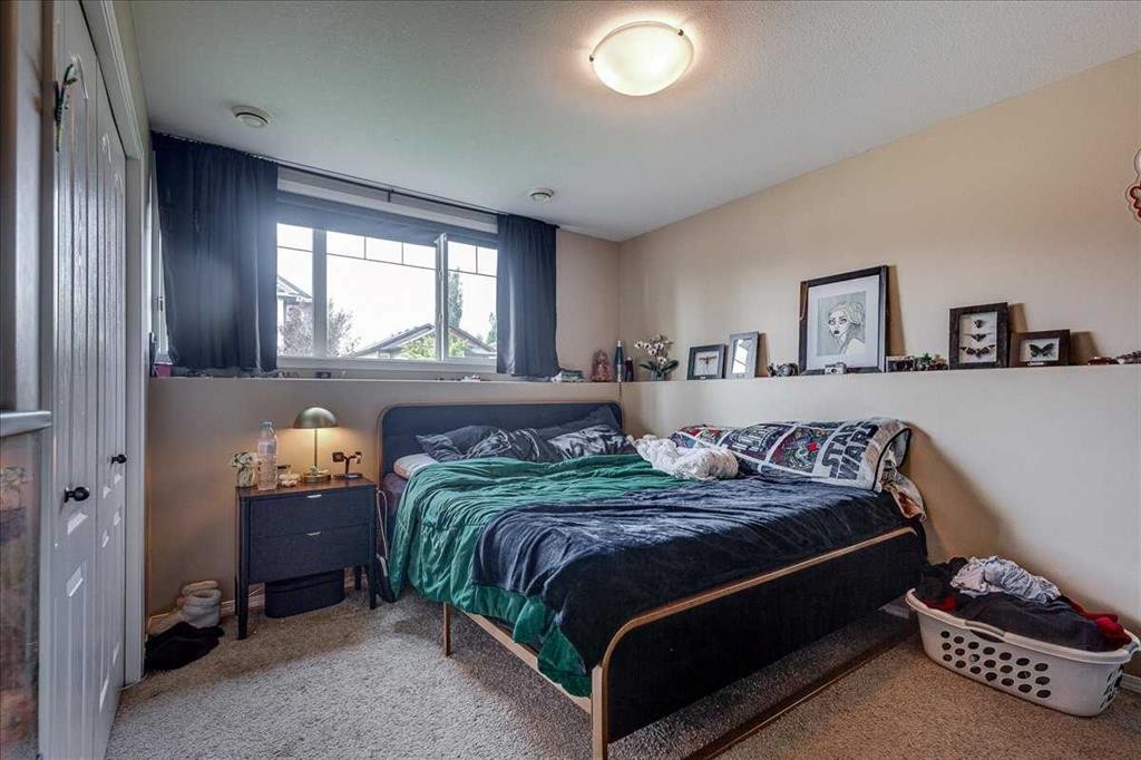 13 Rogers Road, Sylvan Lake, AB - Indoor Photo Showing Bedroom