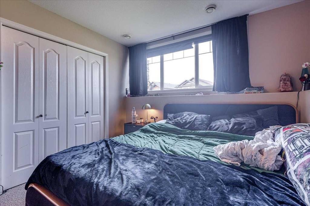13 Rogers Road, Sylvan Lake, AB - Indoor Photo Showing Bedroom