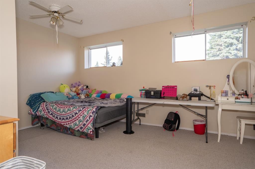 22 Robinson Place, Bashaw, AB - Indoor Photo Showing Bedroom