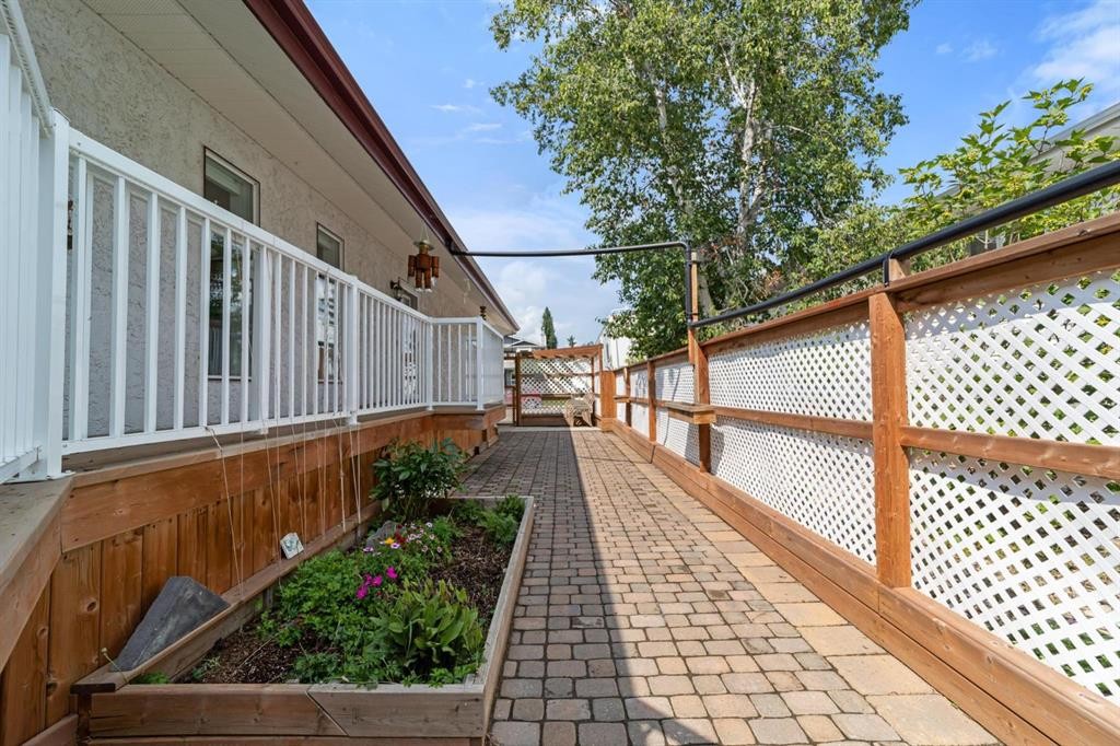 6210 53 Avenue, Camrose, AB - Outdoor With Deck Patio Veranda With Exterior