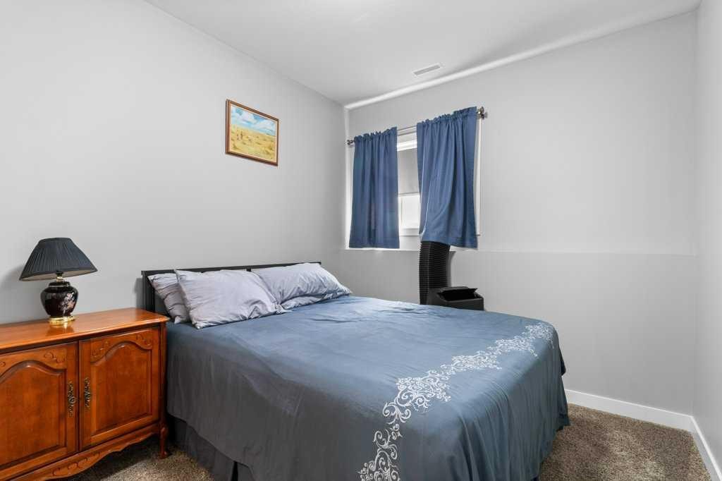 142 Ava Crescent, Blackfalds, AB - Indoor Photo Showing Bedroom
