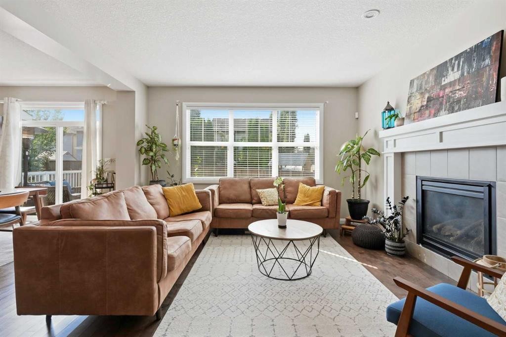 3204 Abbott Crescent Sw, Edmonton, AB - Indoor Photo Showing Living Room With Fireplace