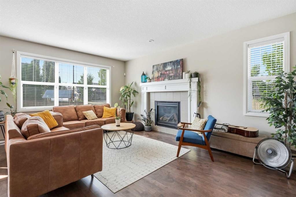 3204 Abbott Crescent Sw, Edmonton, AB - Indoor Photo Showing Living Room With Fireplace
