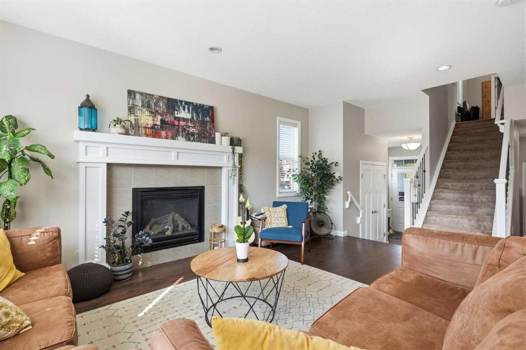 3204 Abbott Crescent Sw, Edmonton, AB - Indoor Photo Showing Living Room With Fireplace