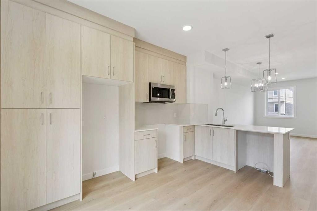 223-75 Cornerstone Row Ne, Calgary, AB - Indoor Photo Showing Kitchen With Upgraded Kitchen