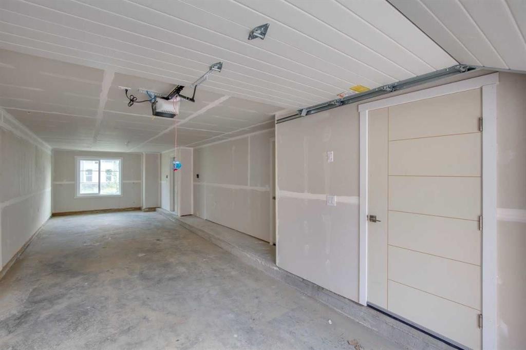 223-75 Cornerstone Row Ne, Calgary, AB - Indoor Photo Showing Garage