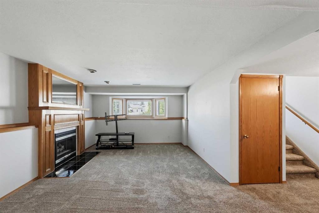90 Duncan Crescent, Red Deer, AB - Indoor With Fireplace