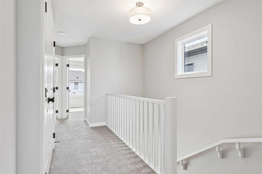 45 Silverton Glen Way Sw, Calgary, AB - Indoor Photo Showing Other Room
