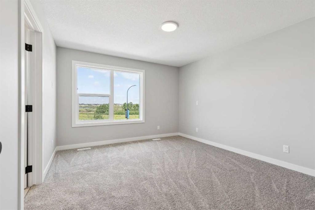 45 Silverton Glen Way Sw, Calgary, AB - Indoor Photo Showing Other Room
