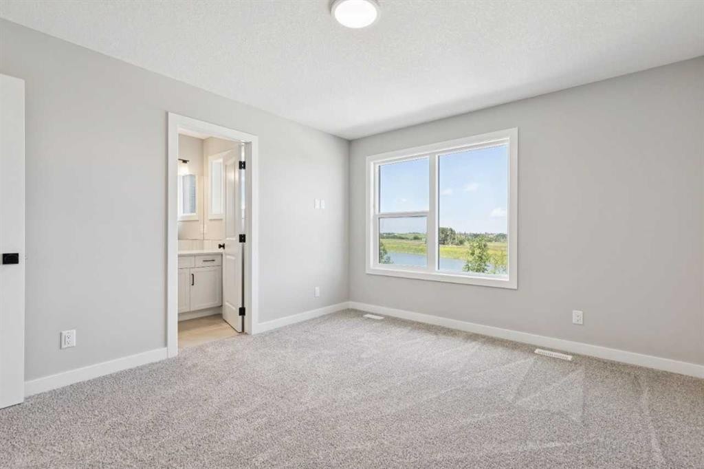 45 Silverton Glen Way Sw, Calgary, AB - Indoor Photo Showing Other Room