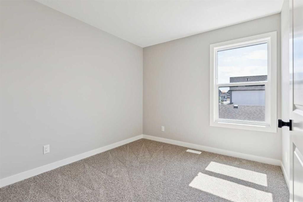 45 Silverton Glen Way Sw, Calgary, AB - Indoor Photo Showing Other Room