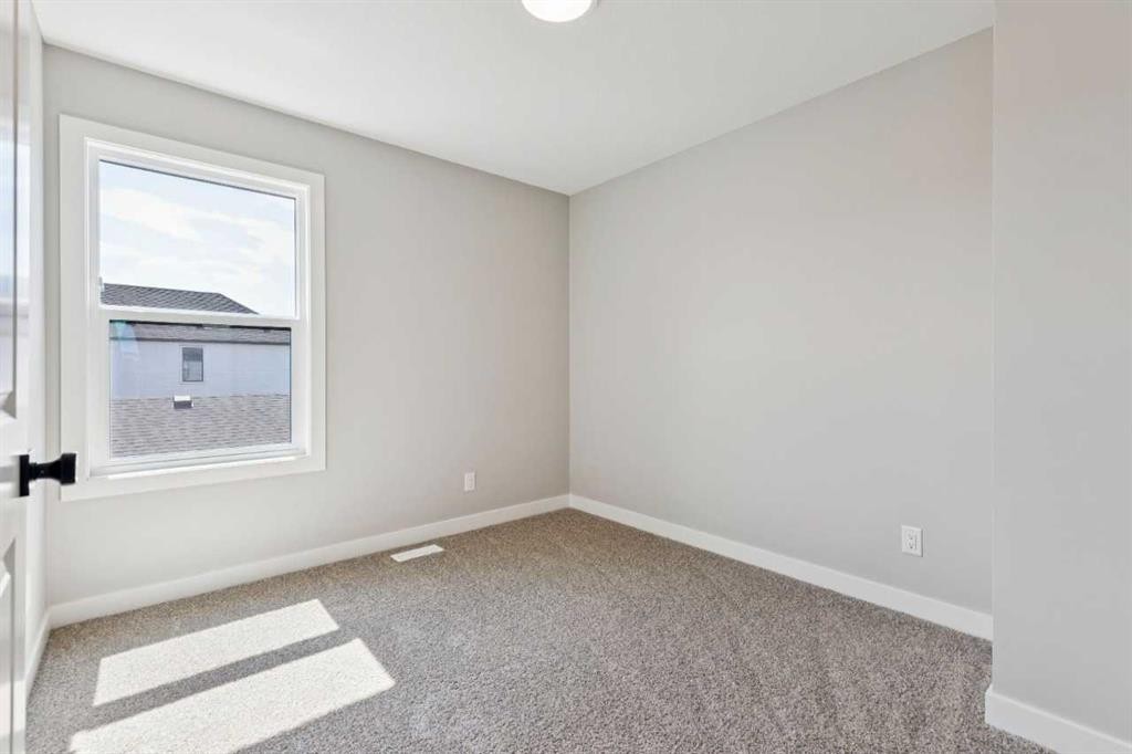 45 Silverton Glen Way Sw, Calgary, AB - Indoor Photo Showing Other Room