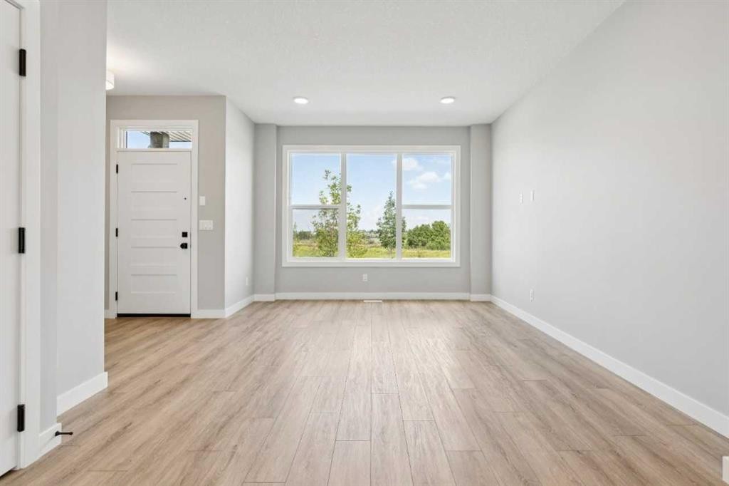 45 Silverton Glen Way Sw, Calgary, AB - Indoor Photo Showing Other Room