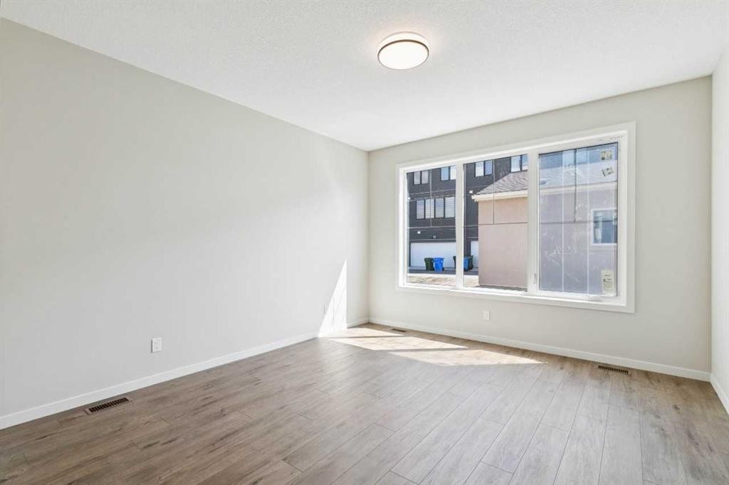 78 Bluerock Hill Sw, Calgary, AB - Indoor Photo Showing Other Room