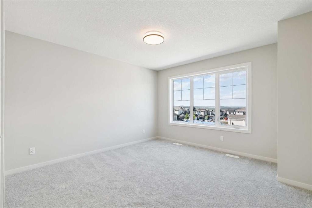 78 Bluerock Hill Sw, Calgary, AB - Indoor Photo Showing Other Room