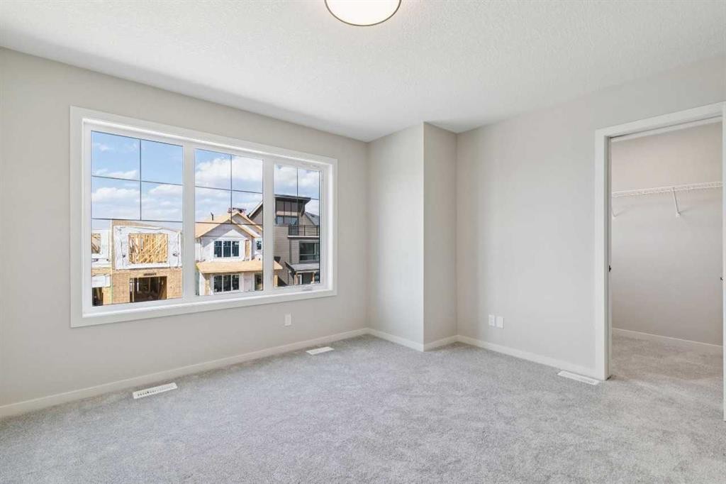 78 Bluerock Hill Sw, Calgary, AB - Indoor Photo Showing Other Room