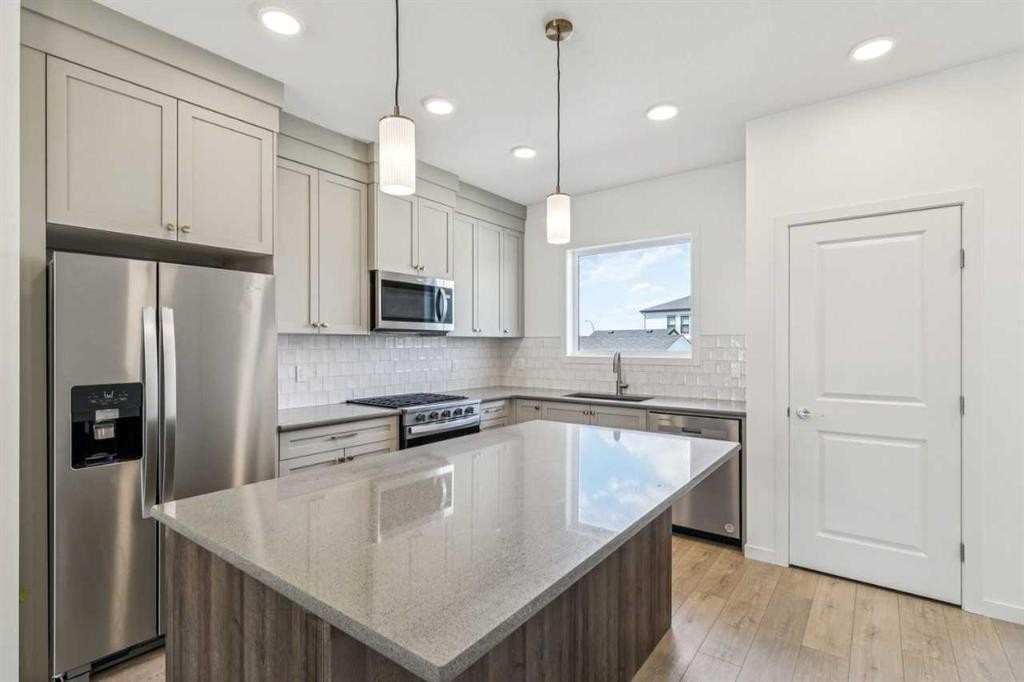 37 Bluerock Hill Sw, Calgary, AB - Indoor Photo Showing Kitchen With Upgraded Kitchen
