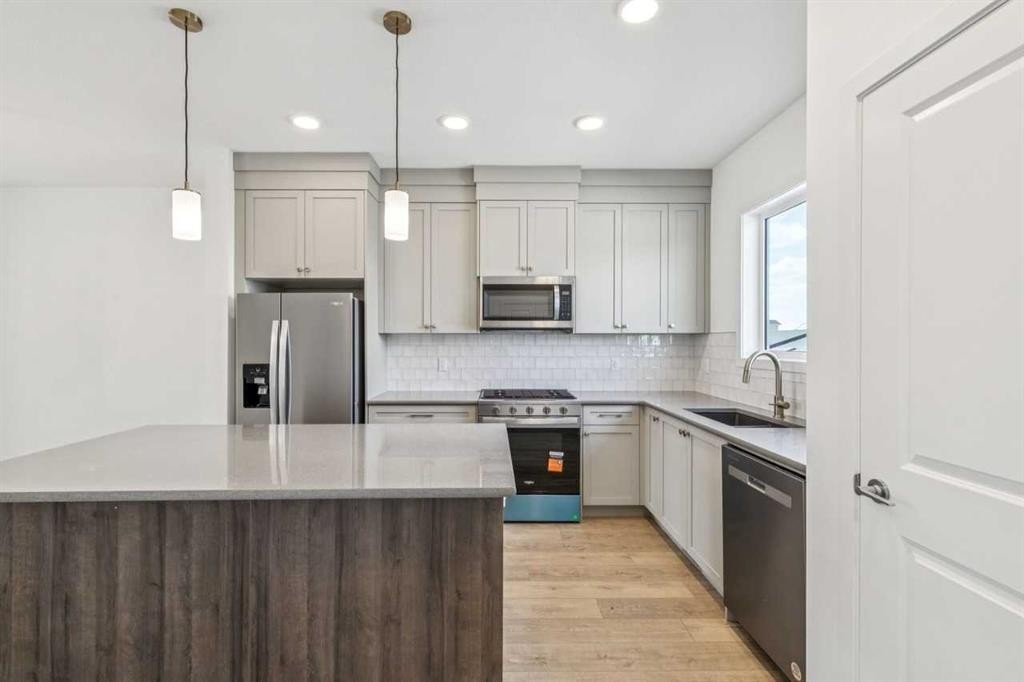 37 Bluerock Hill Sw, Calgary, AB - Indoor Photo Showing Kitchen With Upgraded Kitchen