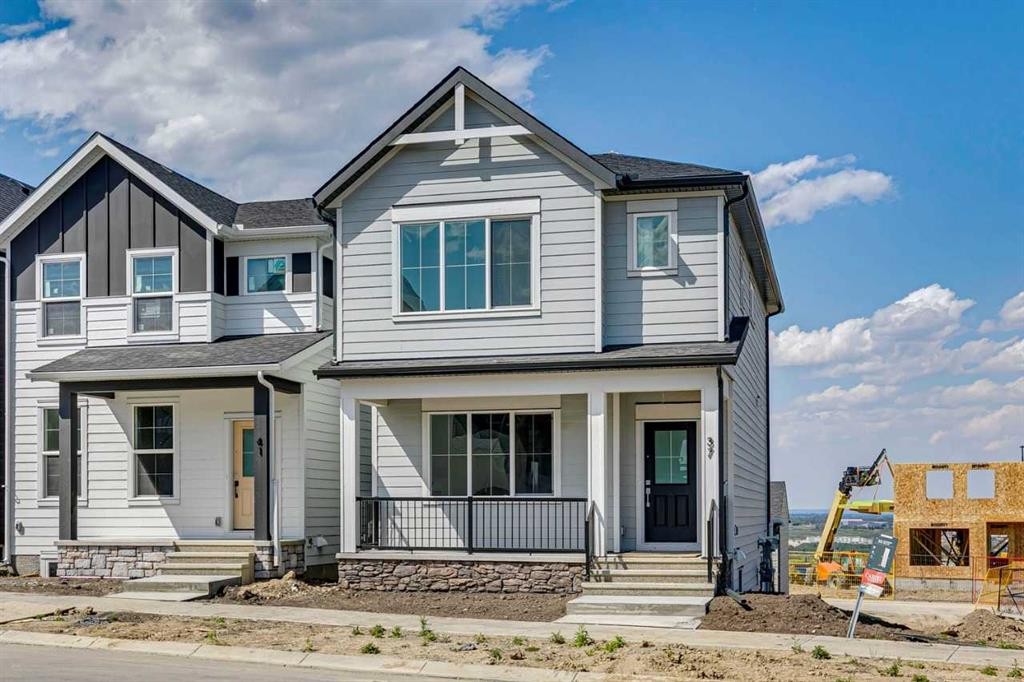37 Bluerock Hill Sw, Calgary, AB - Outdoor With Deck Patio Veranda With Facade