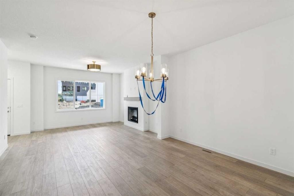 37 Bluerock Hill Sw, Calgary, AB - Indoor Photo Showing Living Room