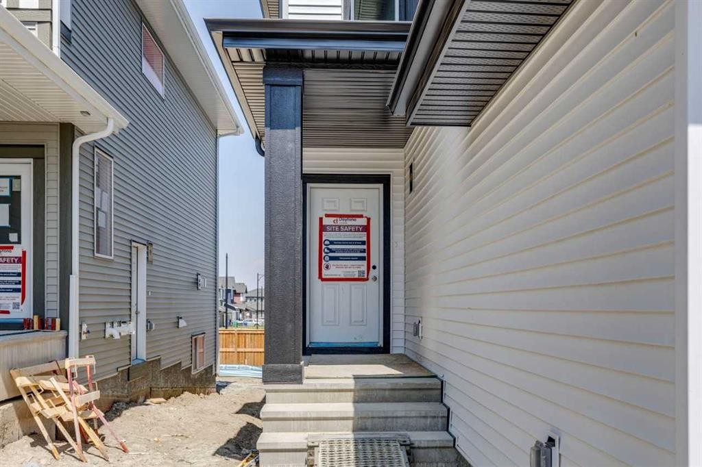 173 Southborough Common, Cochrane, AB - Outdoor With Exterior