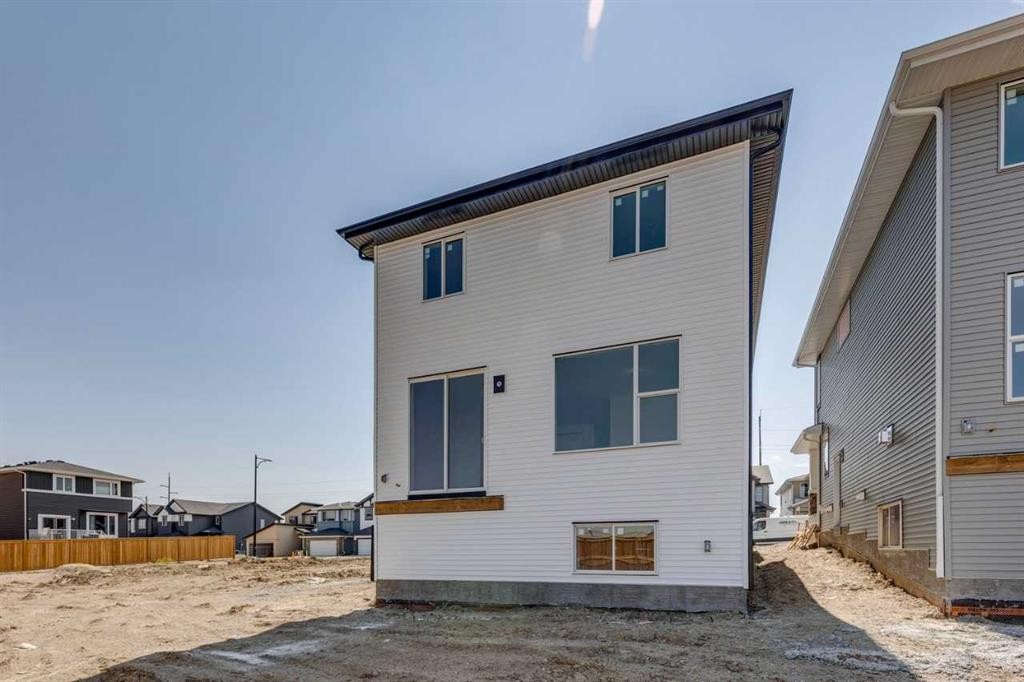 173 Southborough Common, Cochrane, AB - Outdoor With Exterior