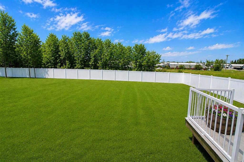 4438 Van Eaton Way, Clive, AB - Outdoor With Backyard