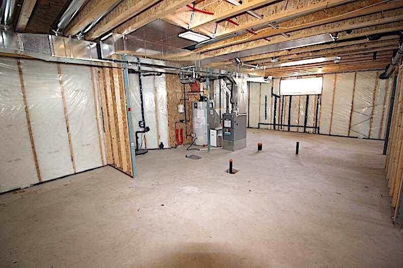 4438 Van Eaton Way, Clive, AB - Indoor Photo Showing Basement