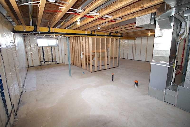 4438 Van Eaton Way, Clive, AB - Indoor Photo Showing Basement