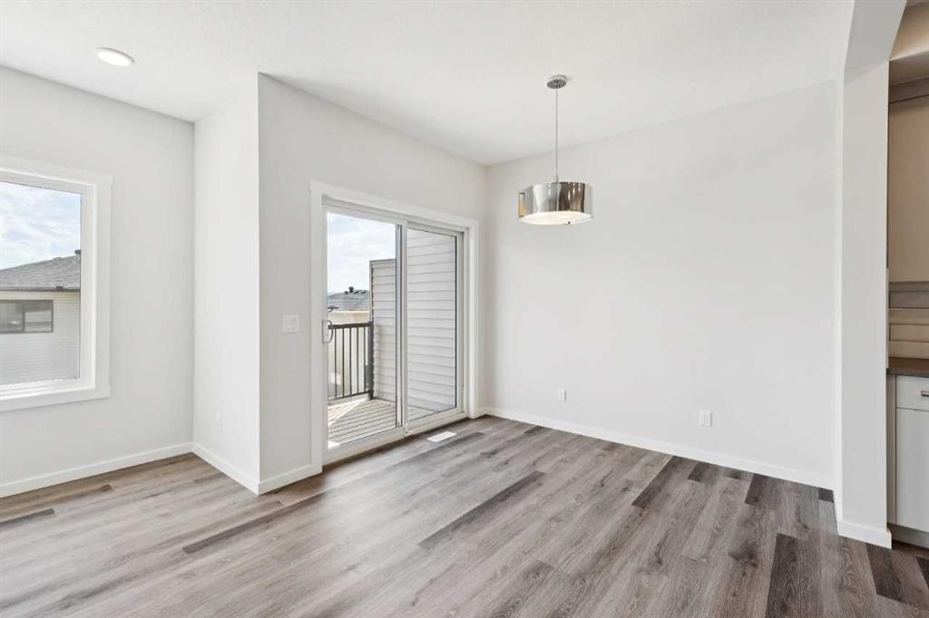 386 Heritage Boulevard, Cochrane, AB - Indoor Photo Showing Other Room