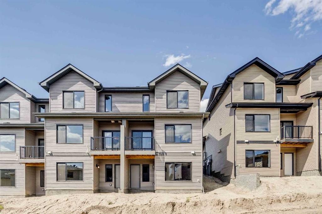 386 Heritage Boulevard, Cochrane, AB - Outdoor With Facade