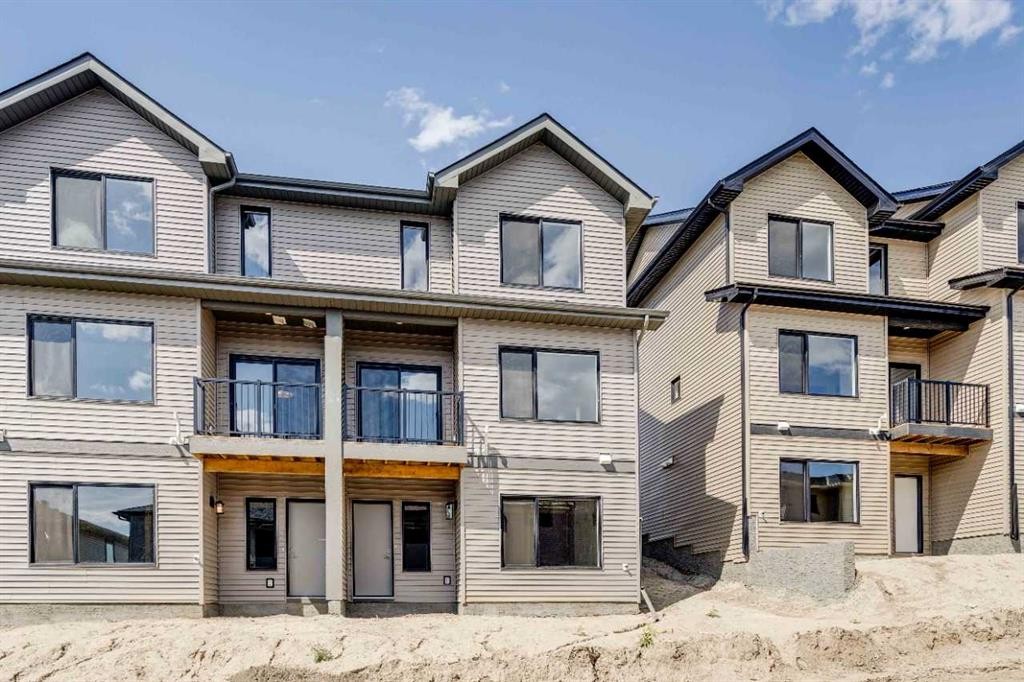 386 Heritage Boulevard, Cochrane, AB - Outdoor With Facade