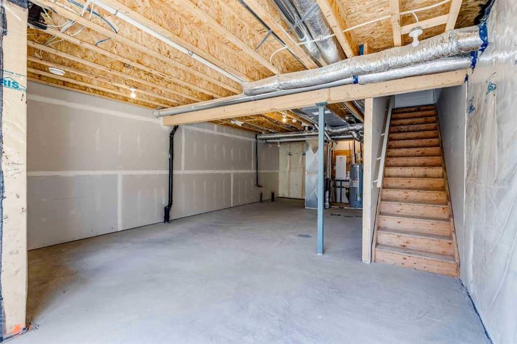 386 Heritage Boulevard, Cochrane, AB - Indoor Photo Showing Basement