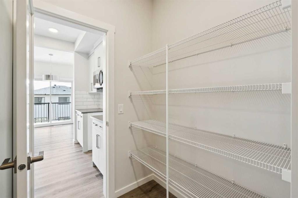 386 Heritage Boulevard, Cochrane, AB - Indoor With Storage