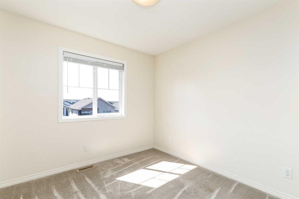 19 Reid Court, Sylvan Lake, AB - Indoor Photo Showing Other Room