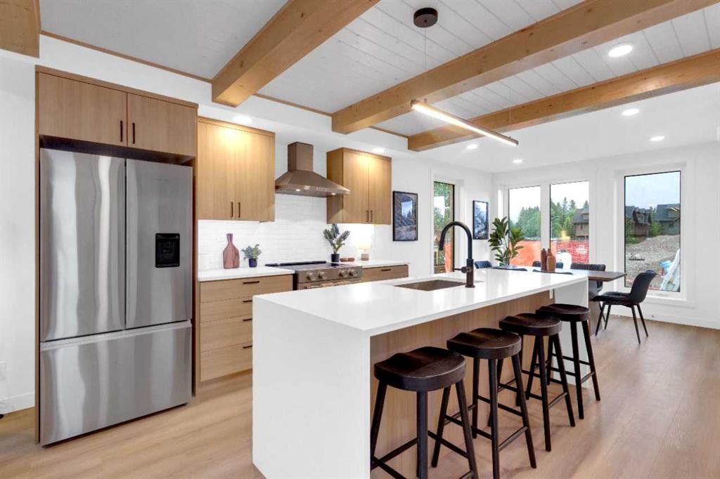 523-608 7 Avenue, Canmore, AB - Indoor Photo Showing Kitchen With Upgraded Kitchen