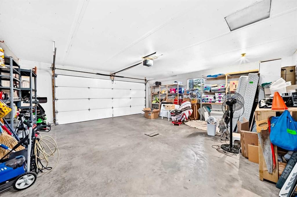 94 Hathaway Lane, Lacombe, AB - Indoor Photo Showing Garage