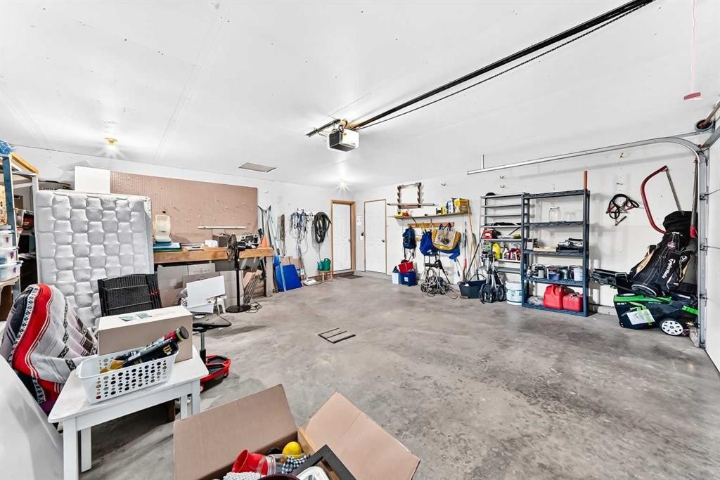 94 Hathaway Lane, Lacombe, AB - Indoor Photo Showing Garage