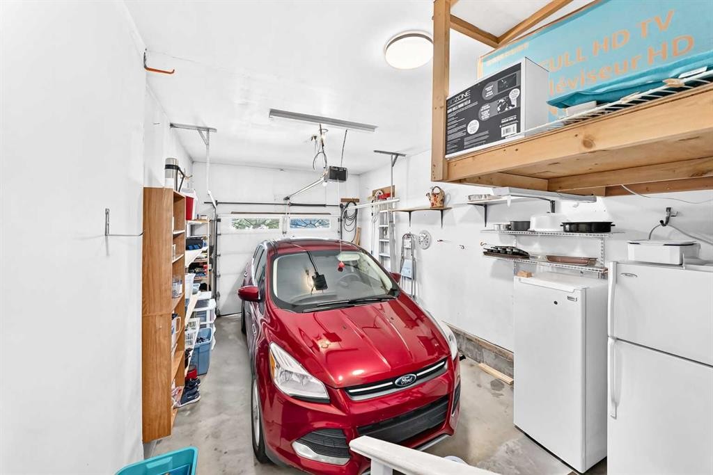 37-2821 Botterill Crescent, Red Deer, AB - Photo Showing Garage